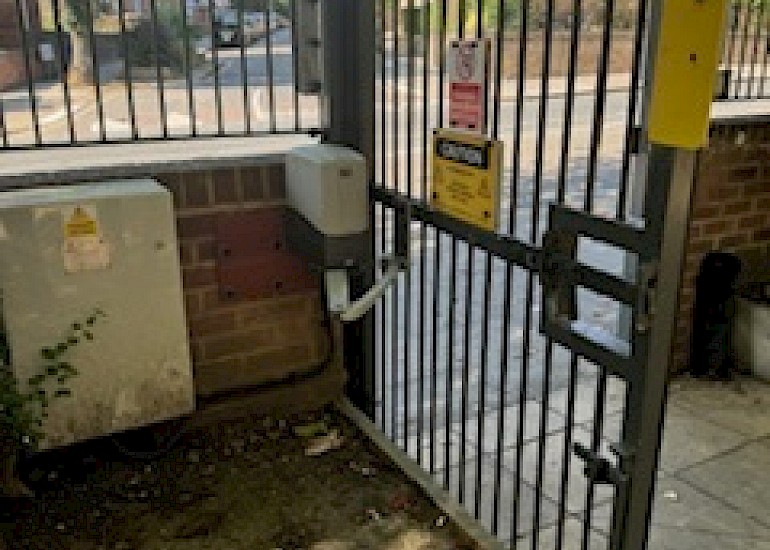 Conway House: Installation of a security gate.